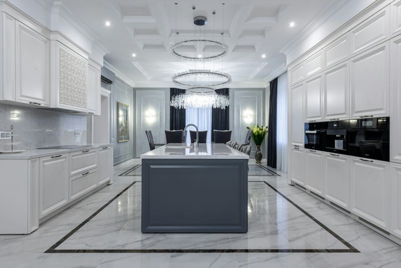 White Kitchens Highlighted By Statement Lighting