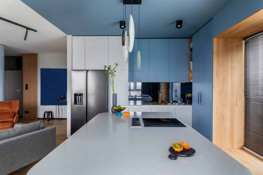 Coastal-Style Gray Kitchen With Blue Accents