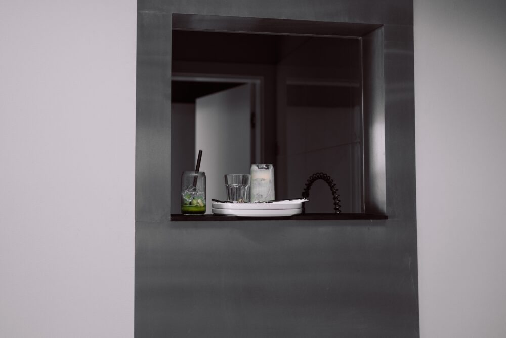 Galley Kitchen Featuring A Pass-Through Window