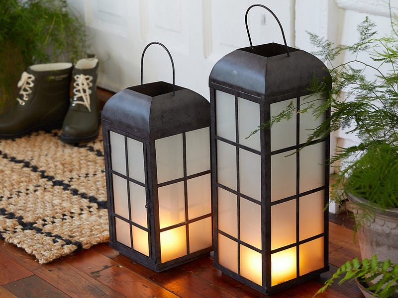 Black Lanterns And White Driftwood Accents
