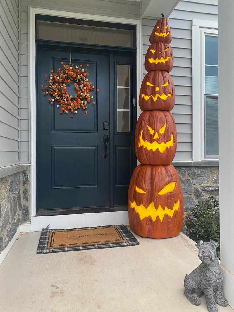 Lit Jack-O-Lantern Tower With Flickering Eyes