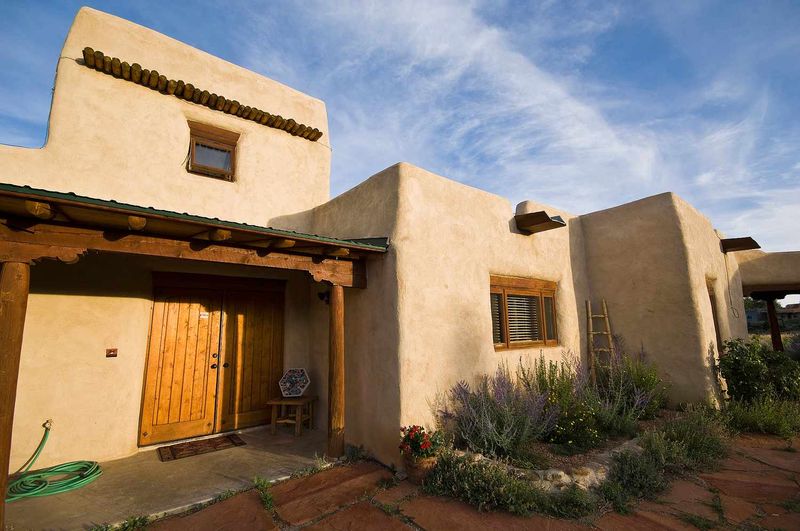 14 Home Styles Experts Say Could Take A Value Hit In Colorado By 2026 - Decor Hint Dated Southwestern Adobe Styles