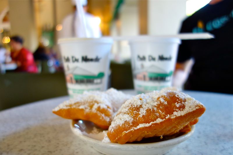 This Iconic Louisiana Café Serves Beignets Worth The Road Trip - Decor Hint What Doesn't Change