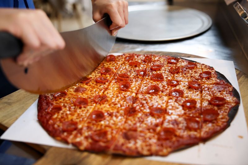 16 Iowa Dining Experiences You'll Be Glad You Tried - Decor Hint Pizza at a Tavern-Style Joint