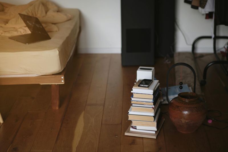 9 Things Professional Organizers Say You Should Remove From Your Bedroom Now - Decor Hint Books You've Already Read