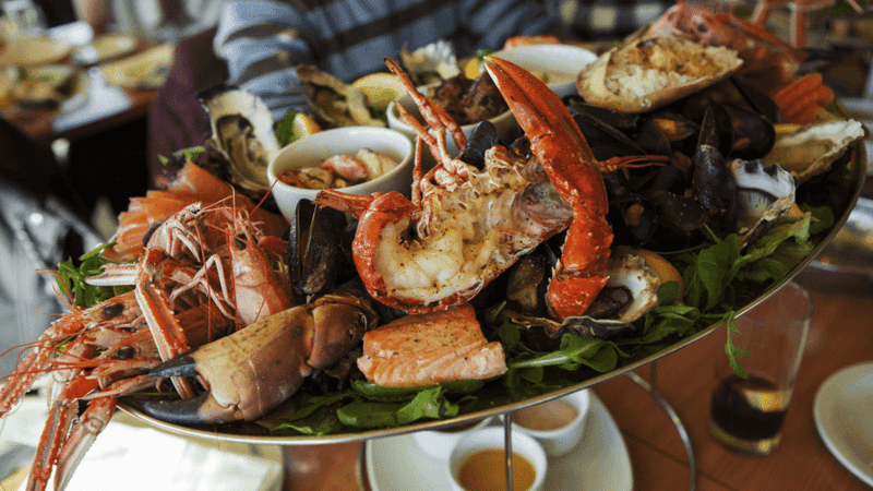 These 13 Texas Seafood Spots Prove The Best Flavor Comes Off The Beaten Path - Decor Hint Millers Seawall Grill in Rockport