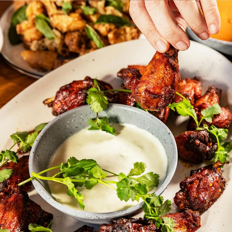 Spicy Dishes In Austin That Pack Real Heat - Decor Hint Loro's Smoked Thai Chili Wings