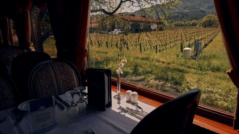 This California Wine Train Combines Scenic Views With Gourmet Dining - Decor Hint Romantic Ambiance Enhanced By Candlelit Tables And Vintage Charm
