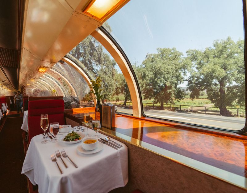 This California Wine Train Combines Scenic Views With Gourmet Dining - Decor Hint White-Tablecloth Dining Experience In A Vintage Railcar Setting