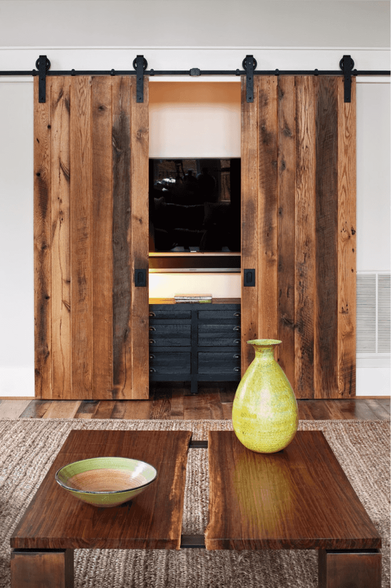 15 Living Oak Designs From Tierra's Texas That Showcase True Southern Sophistication - Decor Hint Reclaimed Oak Barn Door with Iron Hardware