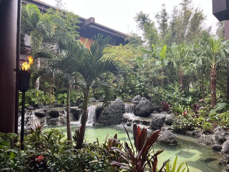 14 Easy DIY Backyard Fountain Ideas In Florida - Decor Hint Tiki-Inspired Fountain With Palm Surrounds