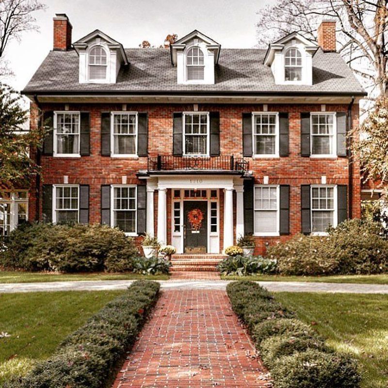 13 Georgia Home Styles Experts Say Could Struggle In 2026's Housing Market - Decor Hint Colonial Homes with Brick Facades and Shutters