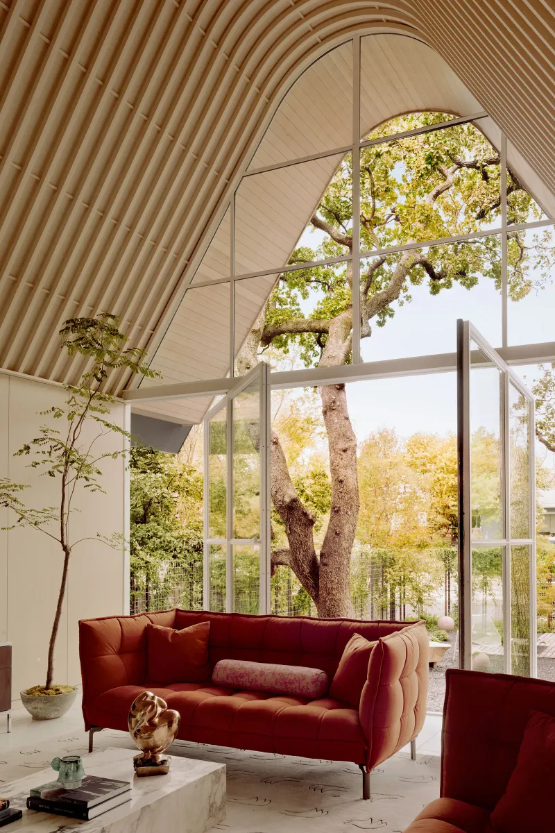 Entry & Living Area With Pivoting Window Walls