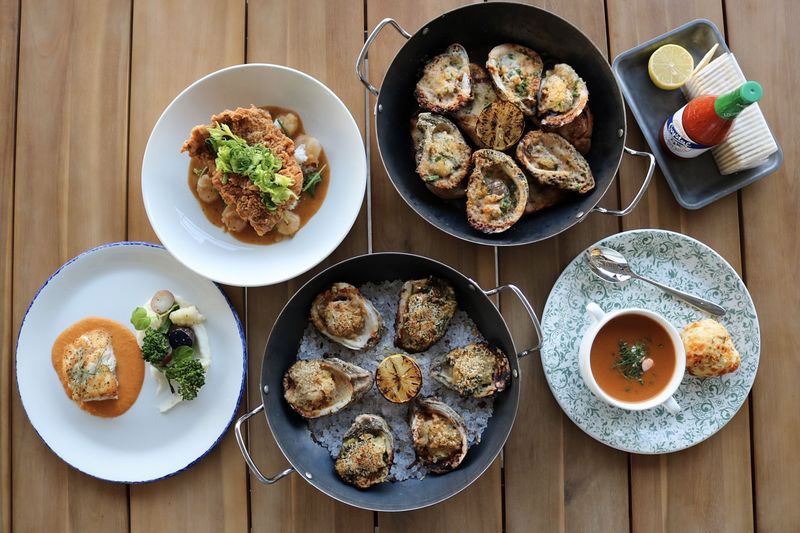 These 13 Texas Seafood Spots Prove The Best Flavor Comes Off The Beaten Path - Decor Hint Railean Rum & Oyster Bar in San Leon