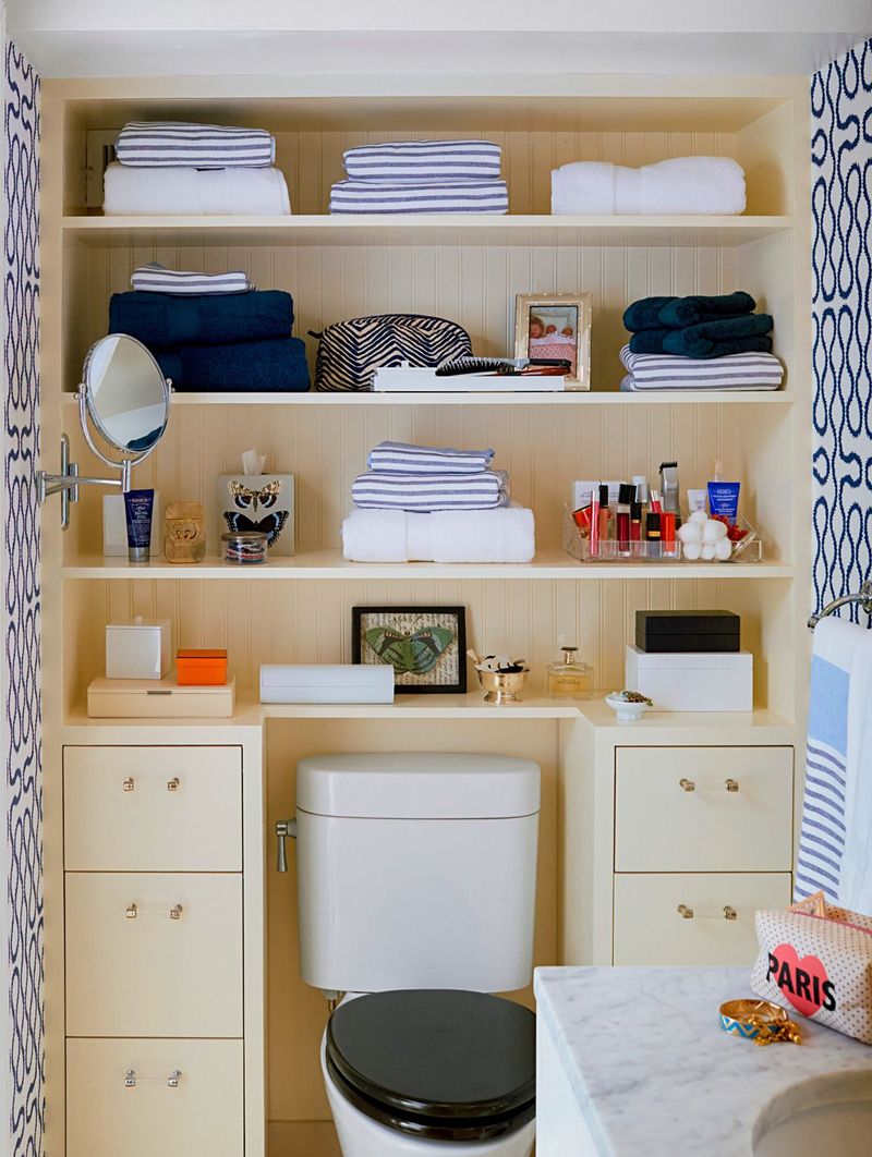 Arizona Experts Say These 10 Bathroom Storage Habits Are A No-Go - Decor Hint Overloading Open Shelving With Clutter