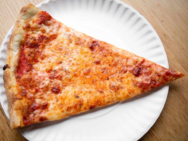 Historic New York City Dishes You Can Still Order Today - Decor Hint New York-Style Pizza Slice