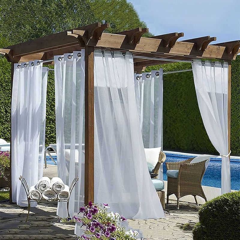 Pergola with Flowing White Curtains
