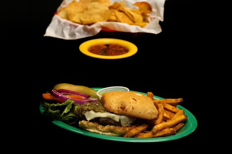 11 New Mexico Restaurants Frying Up Catfish With A Local Twist - Decor Hint Peppers Grill & Bar - Roswell