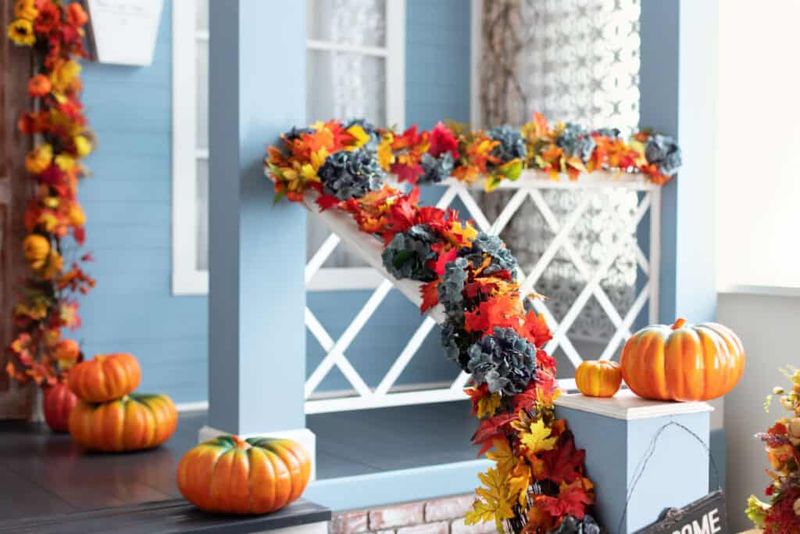 Pumpkin Garlands Hanging Along The Patio Railing