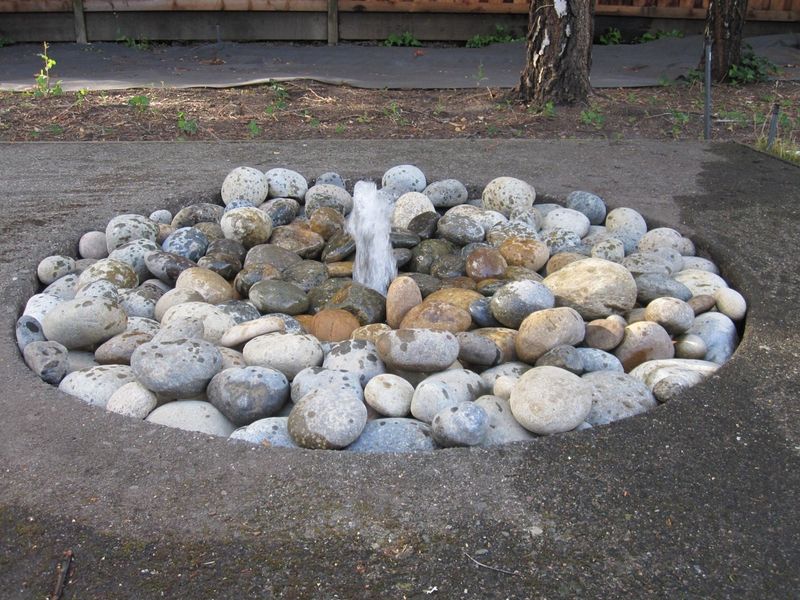 14 Easy DIY Backyard Fountain Ideas In Florida - Decor Hint Hidden Basin Fountain (Disappearing Waterfall)