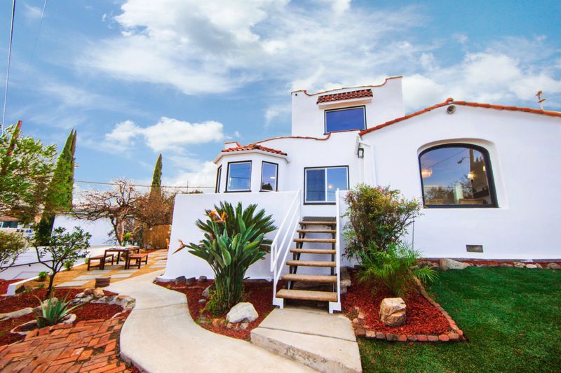Mediterranean Stucco With Faux Balconies