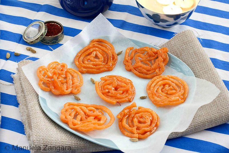 Colorful Jalebi Swirls Dripping With Syrup