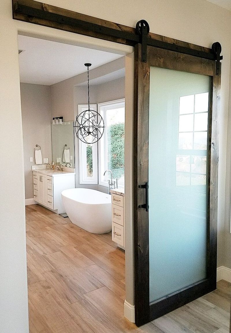 The Rustic Barn Doors In These Kansas Farmhouses That Transform Every Room Instantly - Decor Hint Weathered Wood Sliders for the Master Bedroom