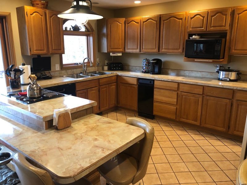 Builder-Grade Oak Cabinets