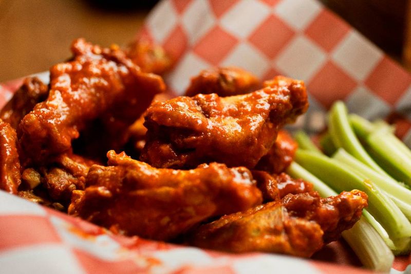 Why Locals Say This Buffalo Wing Spot Is The Best In New York - Decor Hint The Signature Sauce And Serving Style