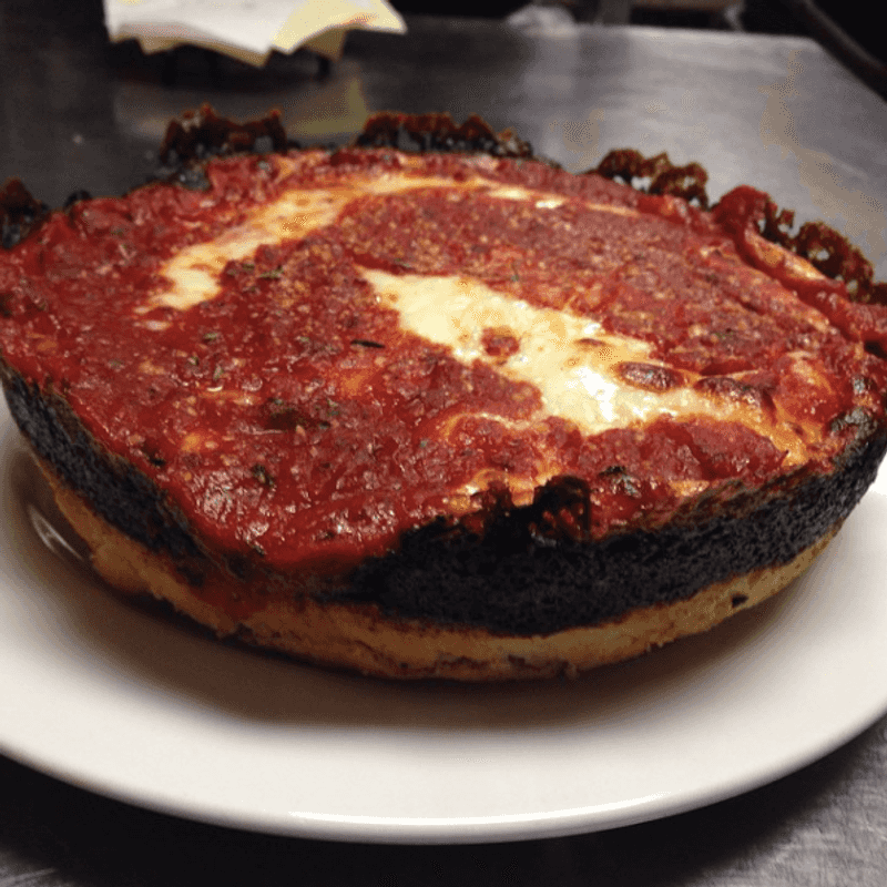 13 Illinois Pizzerias Turning Every Slice Into A Mini-Vacation - Decor Hint Pequod's Pizza