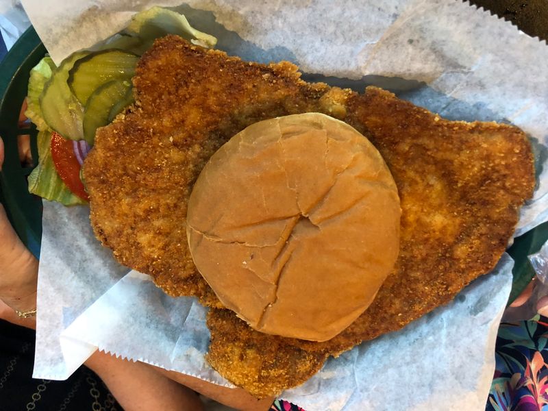 20 Massive Pork Tenderloin Sandwiches In New England You'll Need Two Hands To Tackle - Decor Hint The Breaded Beast at Murphy's Diner - Portland, Maine