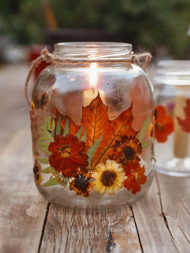Mason Jar With Fall Leaves And Berry Sprigs
