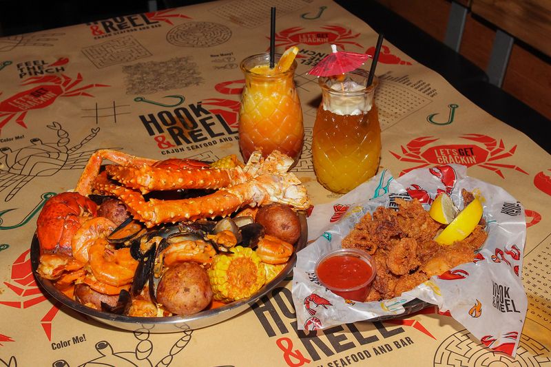 18 Fish Fry Hotspots Across Texas That Bring The Southern Flavor - Decor Hint Hook & Reel Cajun Seafood in Arlington