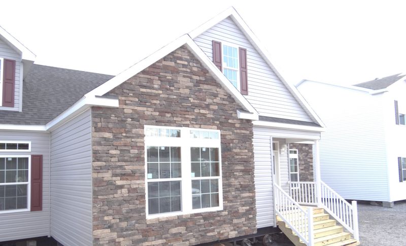 Raised Ranches With Faux Stone