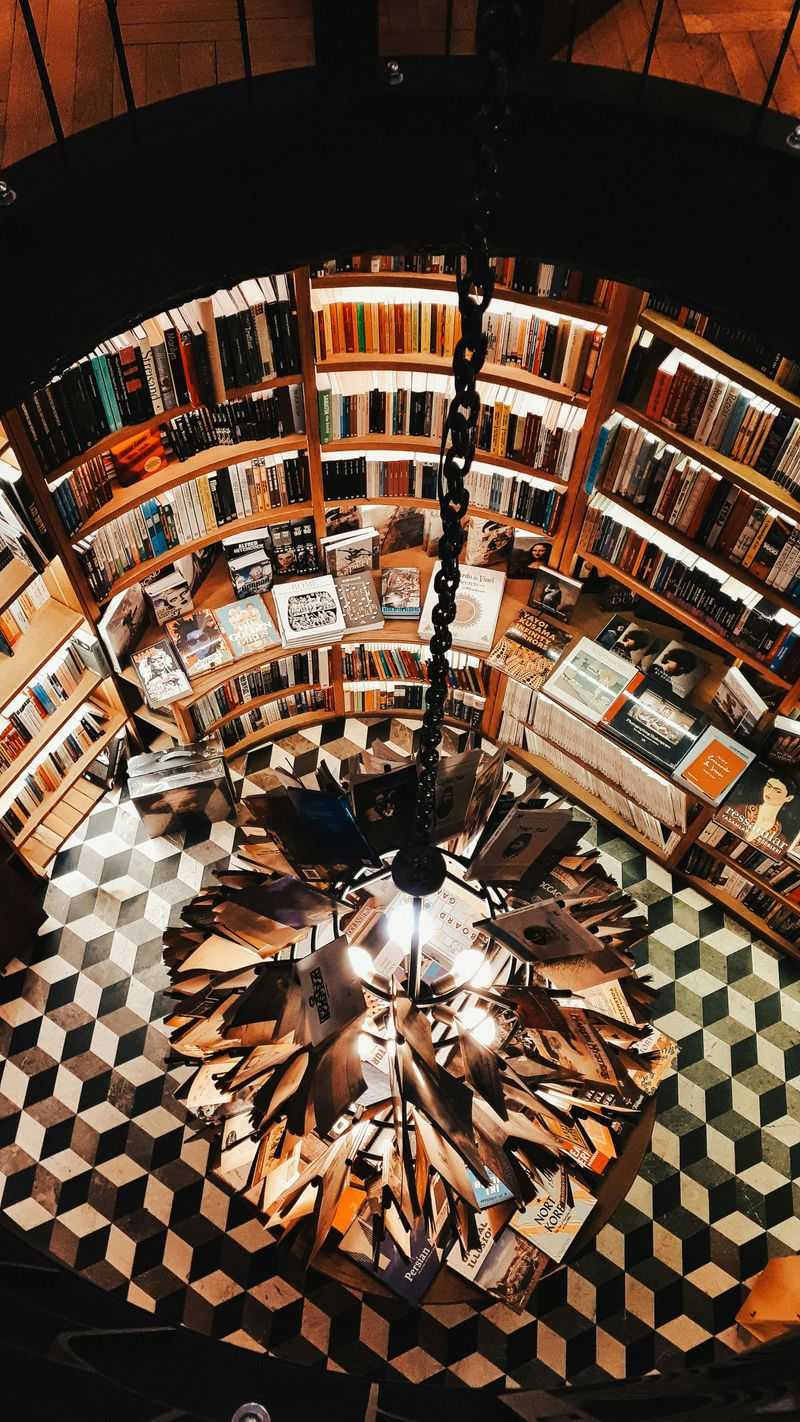 Home Design Tricks That Might Replace The Accent Wall As 2026s Hottest Trend - Decor Hint Floor-To-Ceiling Bookshelves Create Visual Drama