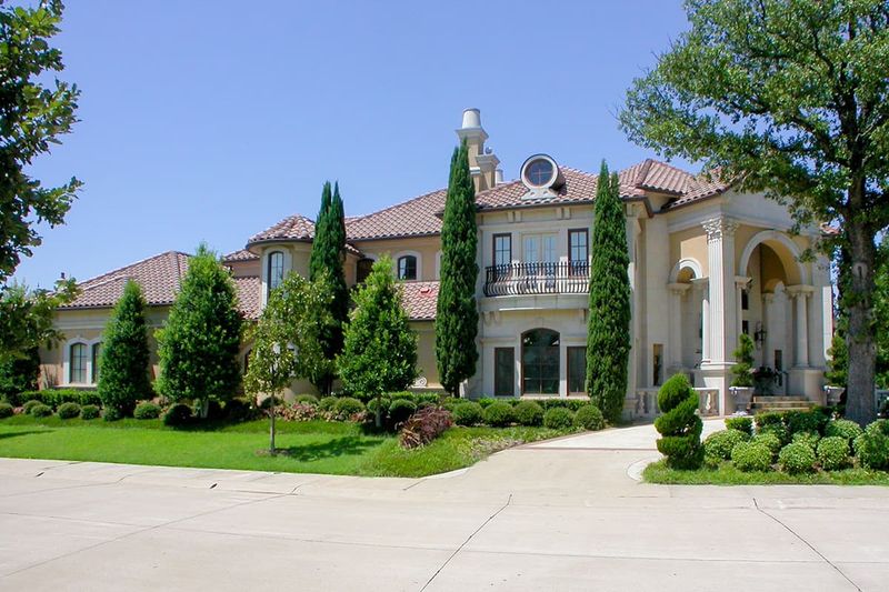 Two-Story Entryways With Oversized Arches
