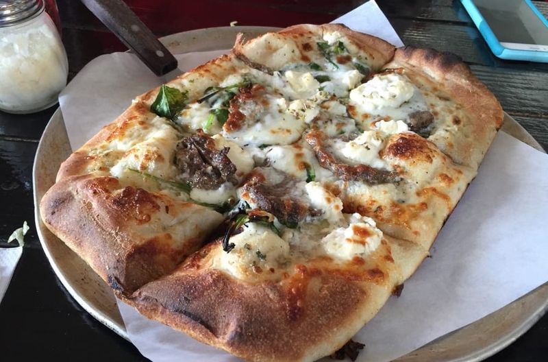 11 Nevada Pizza Joints Worth The Trip For Serious Flavor - Decor Hint Naked City Pizza - Las Vegas