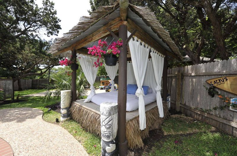 Woven Daybeds With Sheer Canopy Drapes