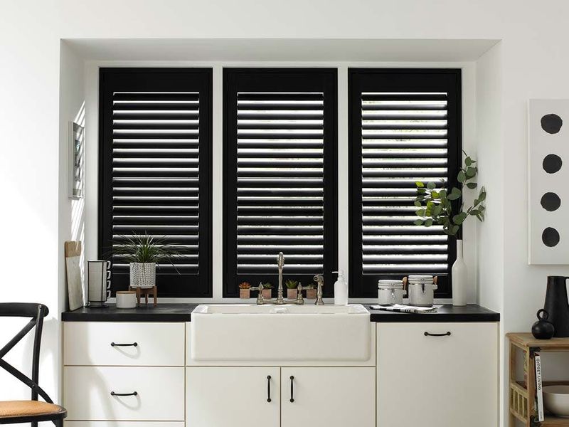 Dated Window Styles That Could Be Hurting Your Home's Aesthetic - Decor Hint Plantation Shutters In Dark Stain