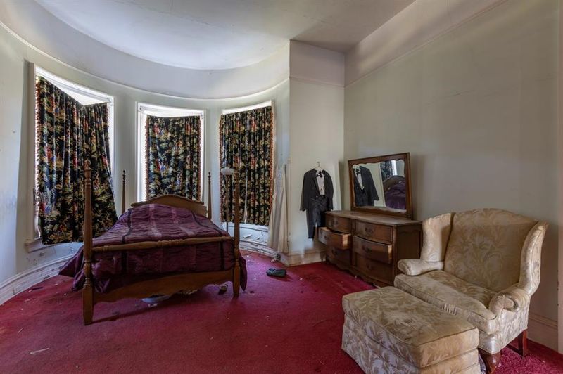 Step Inside This 120-Year-Old Alabama Mansion And Peek Into History - Decor Hint Master Bedroom with Original Victorian Wallpaper
