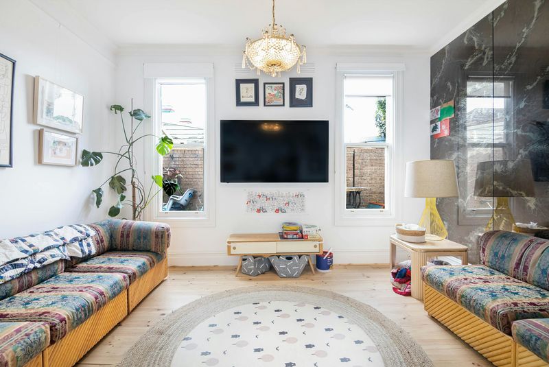 Things Designers Want You To Know Before Hanging A TV Over Your Fireplace - Decor Hint Screen Glare from Windows Ruins Your Picture