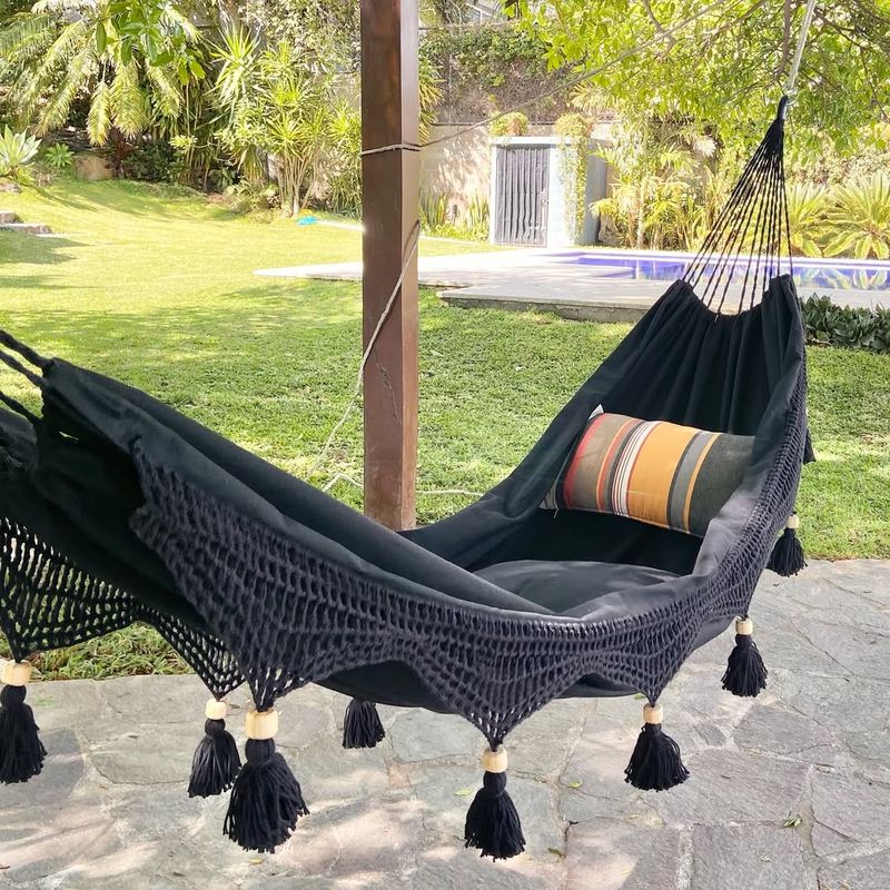 Rattan Hammocks Paired With Patterned Cushions