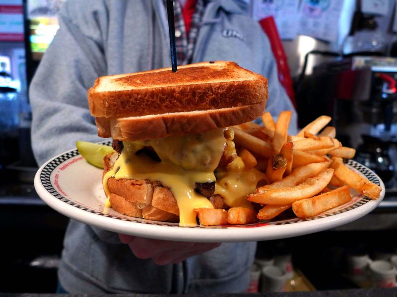20 Massive Pork Tenderloin Sandwiches In New England You'll Need Two Hands To Tackle - Decor Hint Granite State Giant at Red Arrow Diner - Manchester, New Hampshire
