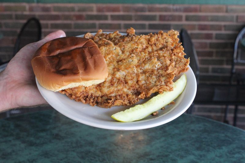 20 Massive Pork Tenderloin Sandwiches In New England You'll Need Two Hands To Tackle - Decor Hint The Litchfield Lunker at Country Kitchen - Litchfield, Connecticut
