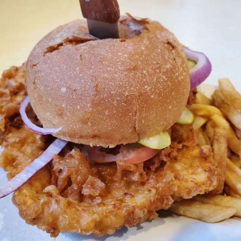 20 Massive Pork Tenderloin Sandwiches In New England You'll Need Two Hands To Tackle - Decor Hint The Lobster Trap Loin at Harbor House - Bar Harbor, Maine