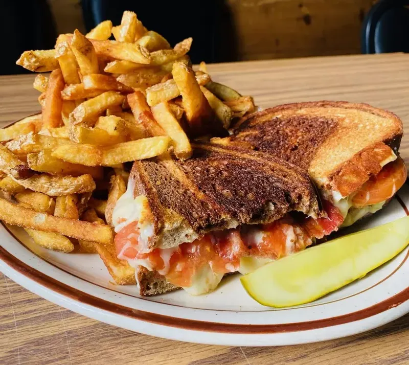 20 Massive Pork Tenderloin Sandwiches In New England You'll Need Two Hands To Tackle - Decor Hint The Penobscot Platter at River Road Diner - Orono, Maine
