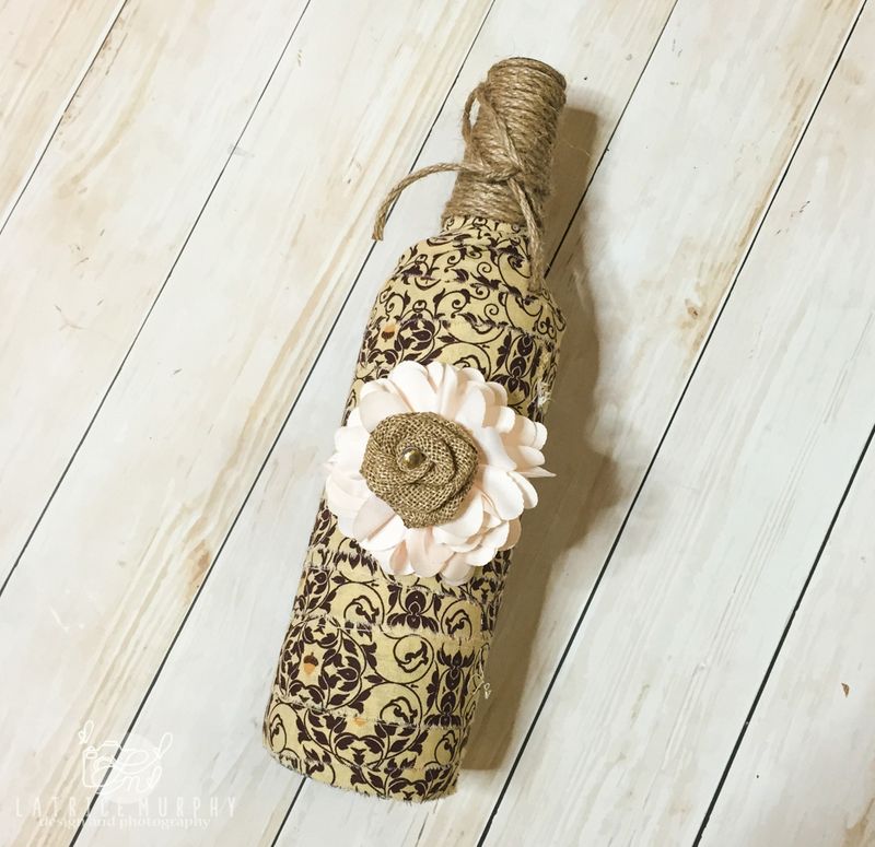 Wine Bottle Wrapped In Burlap With Twine