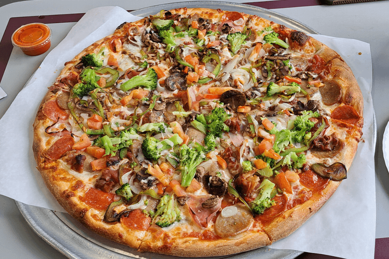 Massachusetts Pizza Spots Locals Say Beat The Big Chains Every Time - Decor Hint Stash's Pizza in Dorchester