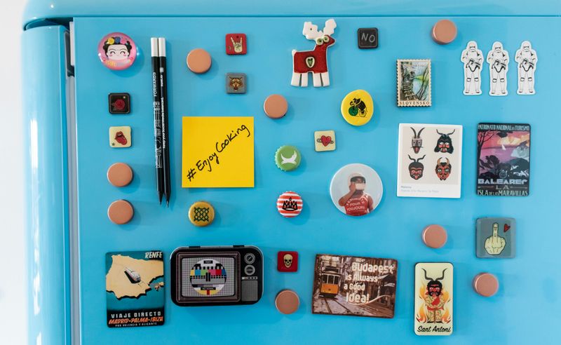 Experts Say These 16 Household Items Are Holding Back Your Home's Style - Decor Hint Refrigerator Magnets Covering Your Fridge