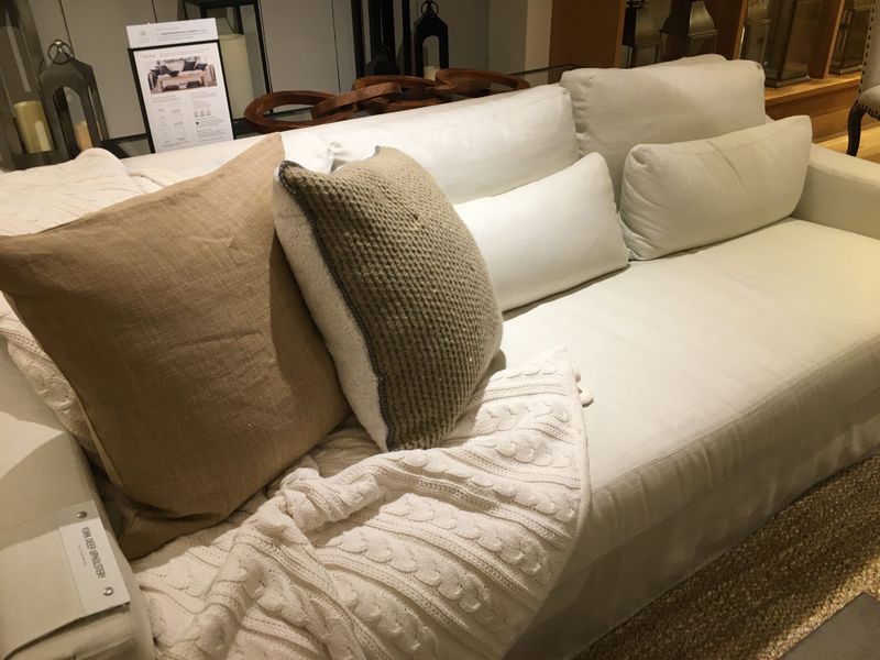 12 Ways To Cozy Up Your Texas Home This Winter With Neutrals And Greenery - Decor Hint Layer Cream And Beige Throw Blankets